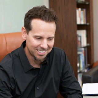 scott_smiling_in_chair