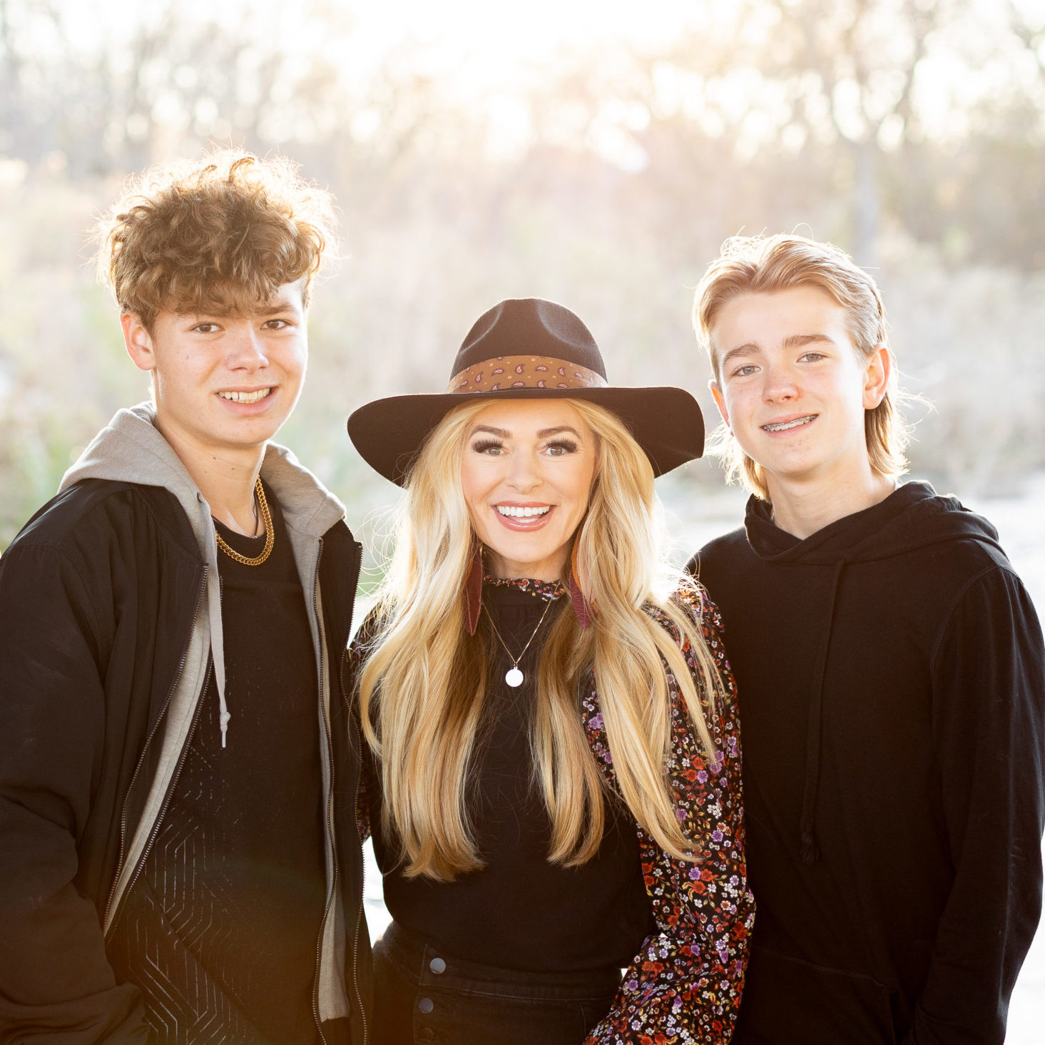 Mom and her boys by the creek